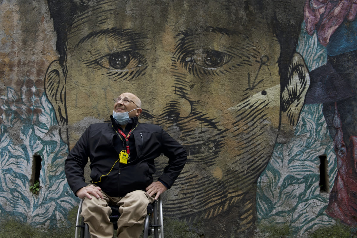 uomo-carrozzina-man-wheelchair-viso-face-murales